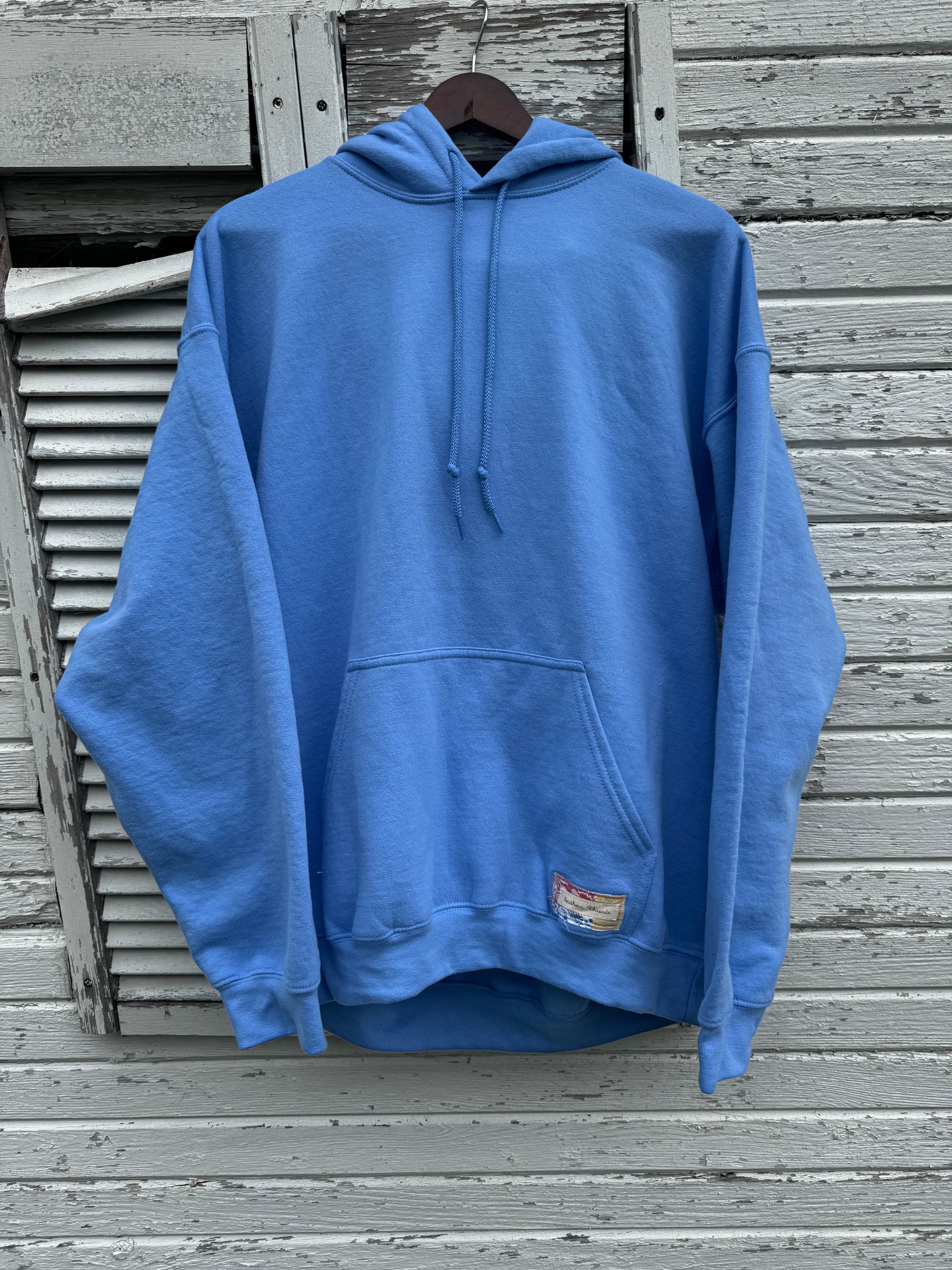 Large Carolina Blue Sweatshirt w/ Flower